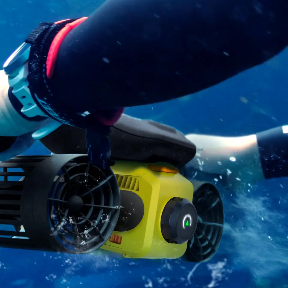 Swimmer using a LEFEET C1 underwater scooter while snorkeling