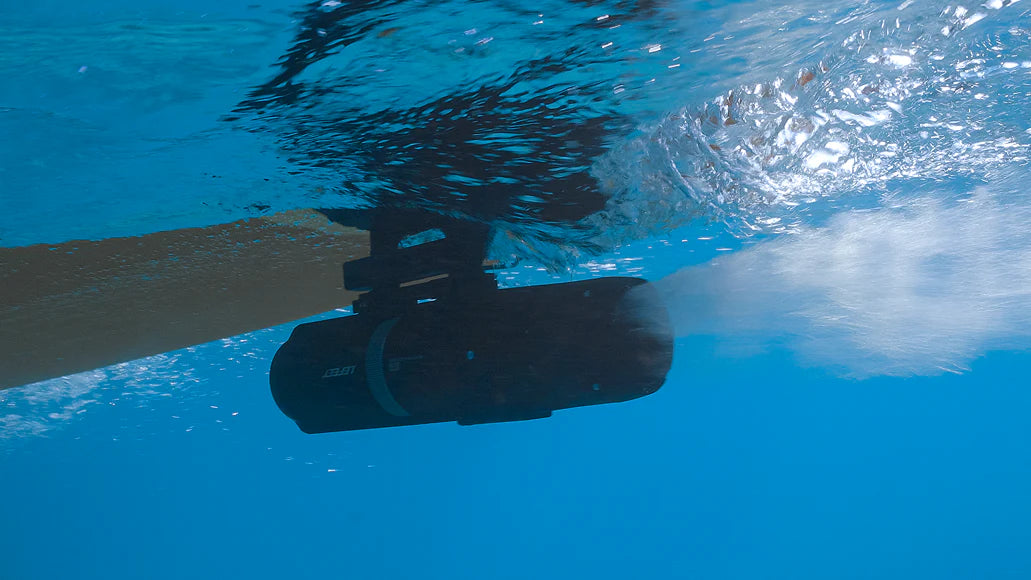 LEFEET underwater scooter mounted beneath a stand-up paddleboard
